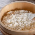 sushi rice in container with spoon | Uwajimaya